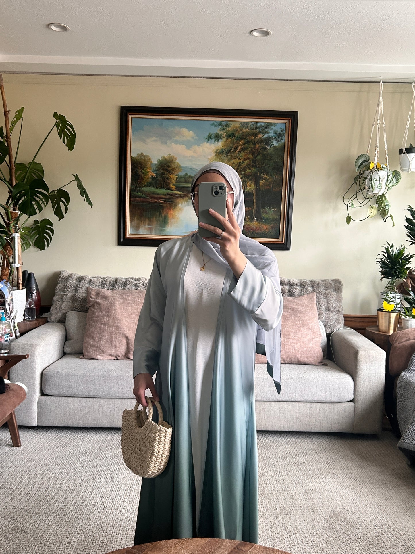 Elegant green abaya showcasing modest clothing style for contemporary fashion lovers.